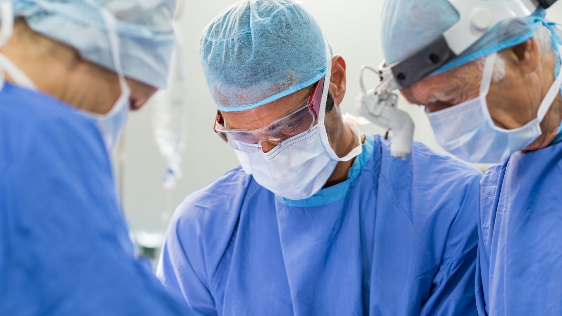 Team of surgeons operating